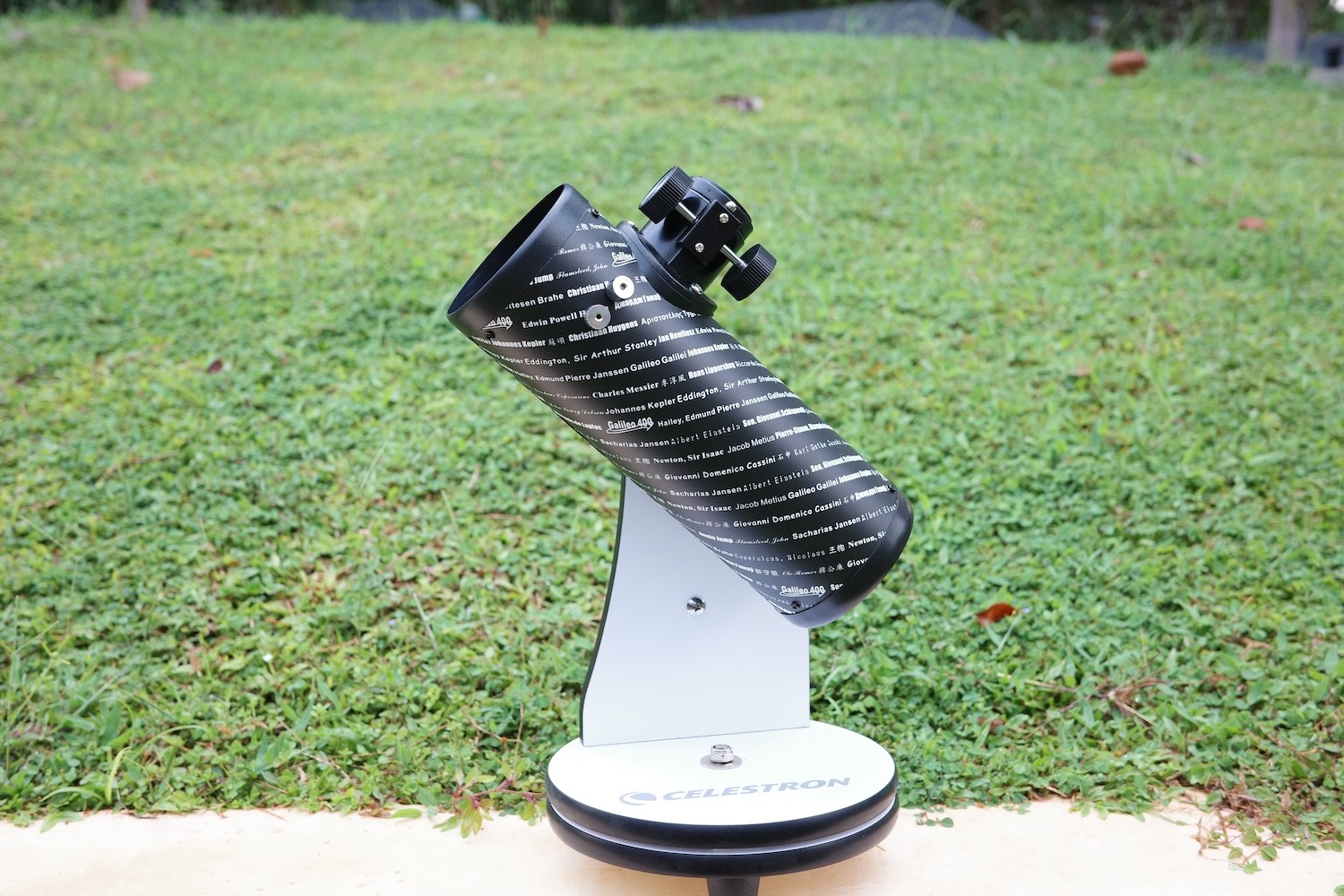 Celestron Firstscope Tabletop Dobsonian Telescope in a backyard