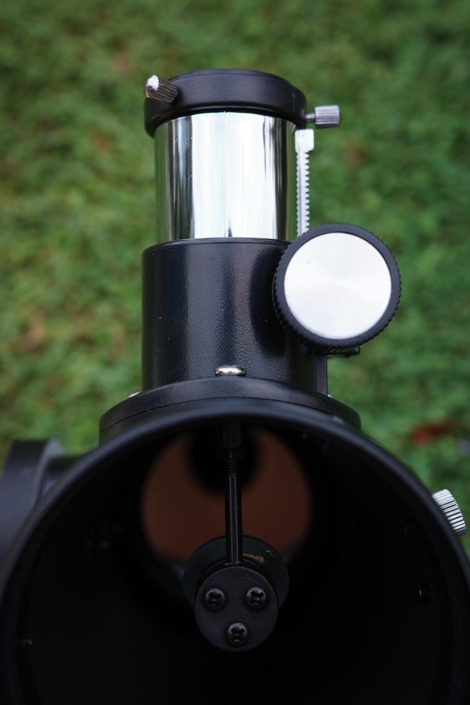 Top view of the Firstscope's plastic rack-and-pinion focuser with it fully racked out, but without the eyepiece added.
