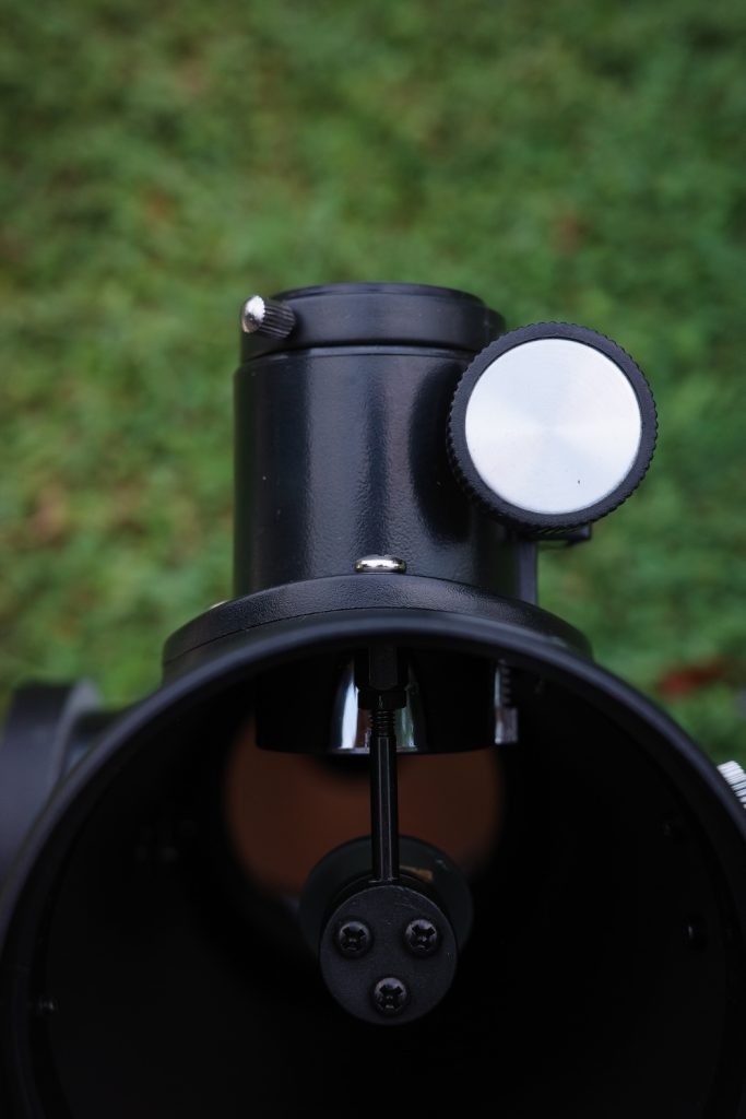Top view of the Firstscope's plastic rack-and-pinion focuser with it fully racked in, but without the eyepiece added.