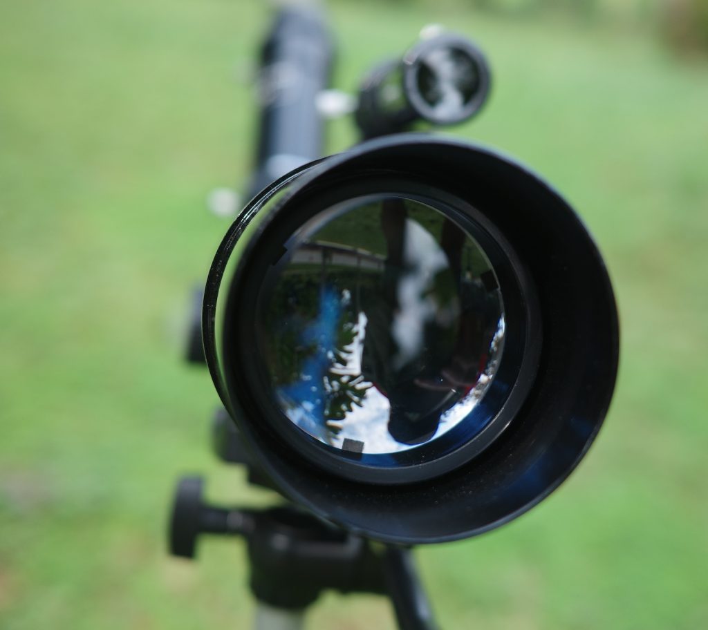 The refractor lens of Celestron Travel Scope 50