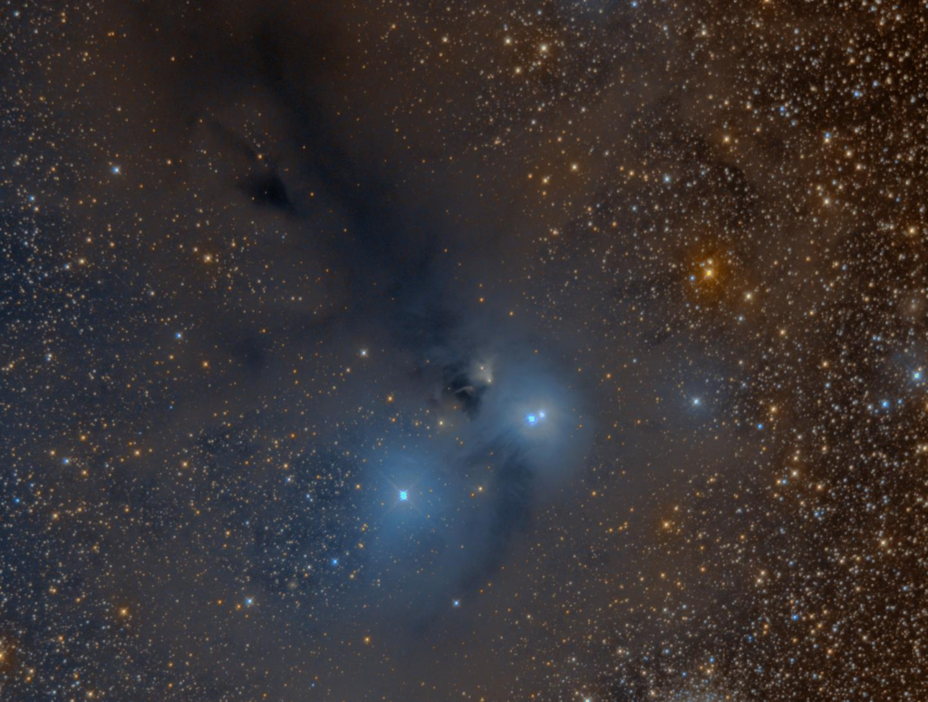 An image I took of the Corona Australis dark nebulae with the ASI1600MM, and Red, Green and Blue filters.