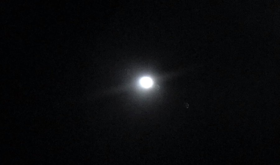 Blurry image of Jupiter through a telescope