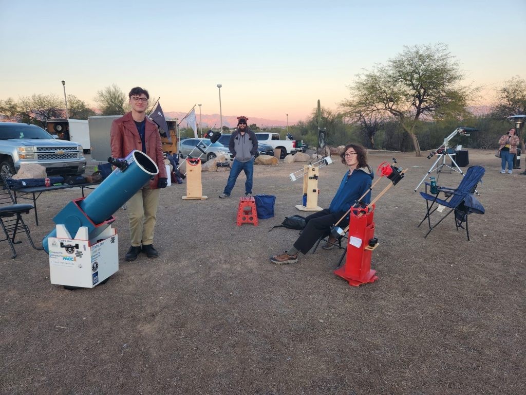 Zane Landers with his telescopes for testing it for TelescopicWatch along with Jordanne Brisby
