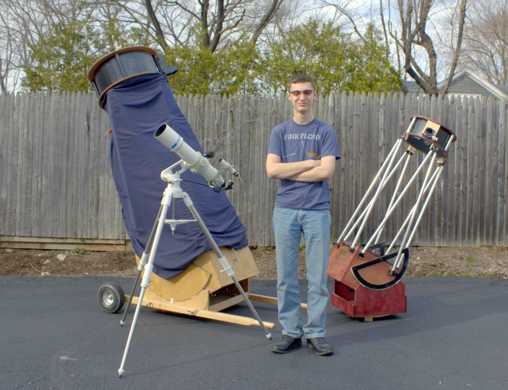 Zane Landers with two of his dobsonians and a refractor