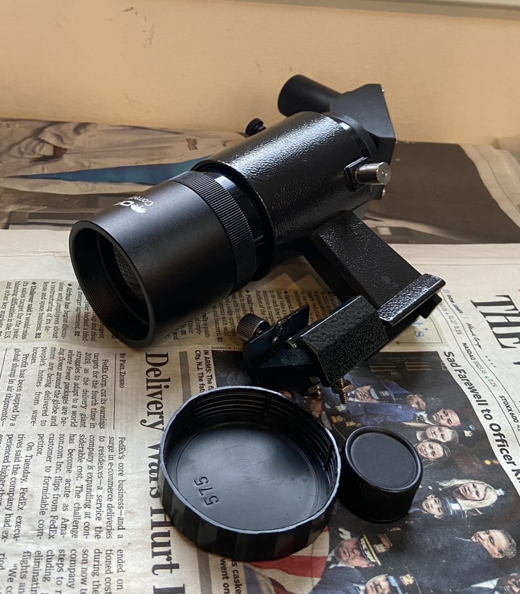 Zane's Orion 9x50 Right-Angle Correct-Image Finder Scope on a table